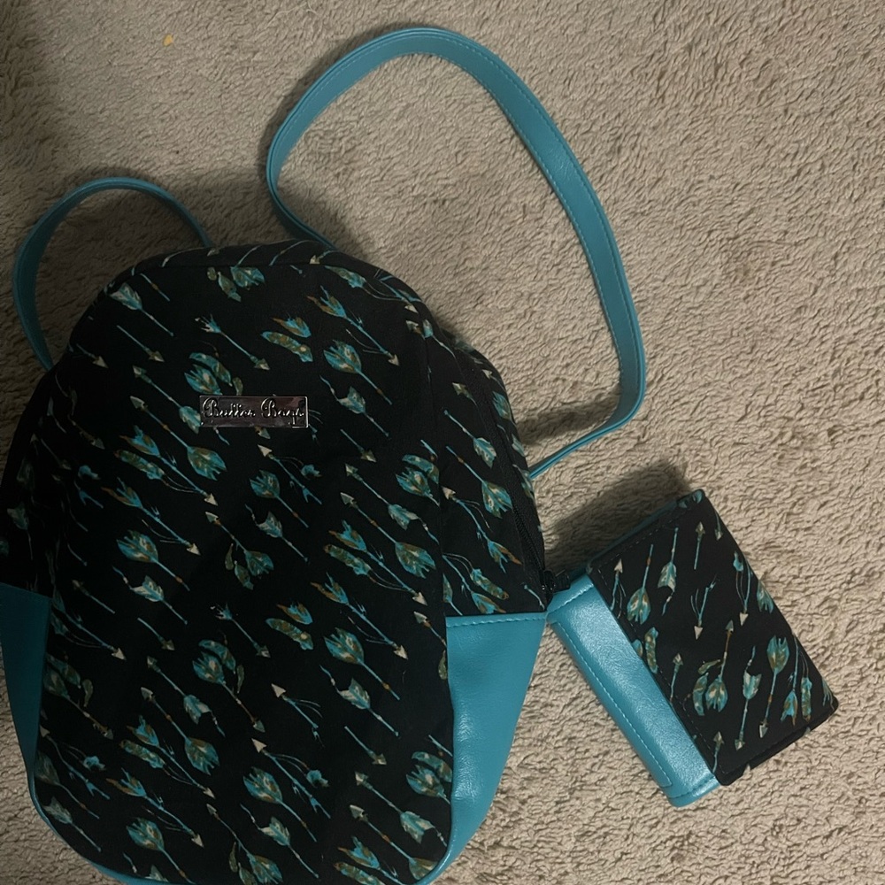 Butter Bags backpack and wallet. Made with new LULAROE leggings and leather